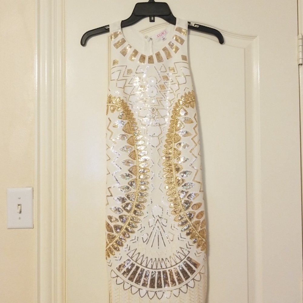 White and gold sequence dress